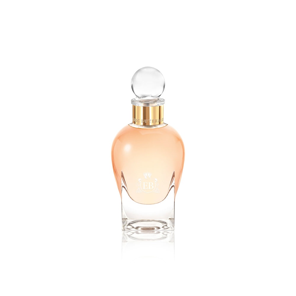 100 ml bottle, with transparent glass and orangey  perfum. Spherical cap with gold band. Maiden Orange Blossom, a fragrance by Eric Butherbaugh.